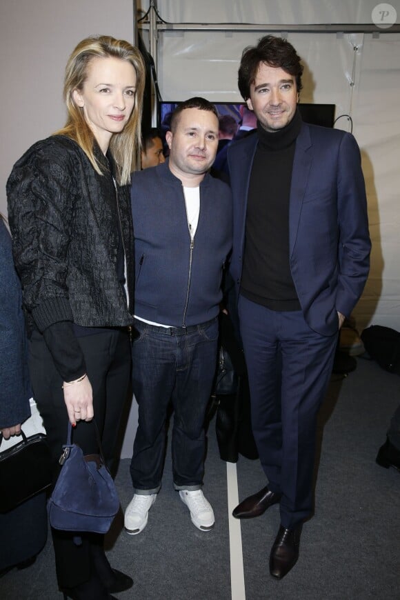 Delphine Arnault, Kim Jones et Antoine Arnault dans les coulisses du défilé homme Louis Vuitton automne-hiver 2014-2015. Paris, le 16 janvier 2014.