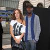 Thomas Ngijol et sa compagne Karole Rocher lors du défilé des Galeries Lafayette à Paris le 18 septembre 2012