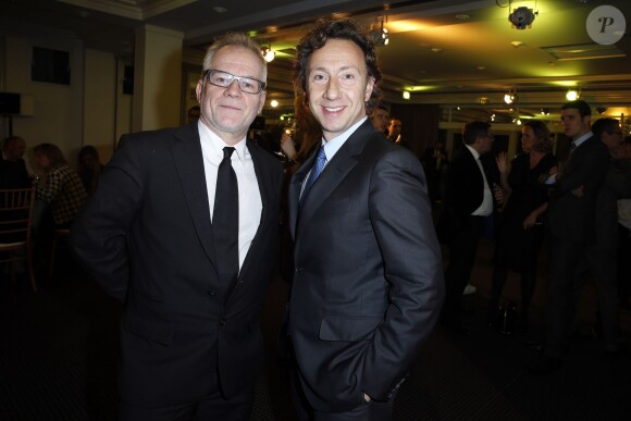 Thierry Frémaux et Stéphane Bern lors du Dîner de la mode pour le Sidaction au Pavillon d'Armenonville à Paris, le 23 janvier 2014.
