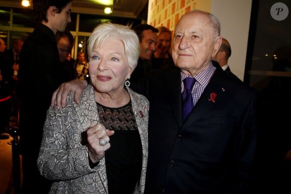 Line Renaud et Pierre Bergé lors du Dîner de la mode pour le Sidaction au Pavillon d'Armenonville à Paris, le 23 janvier 2014.