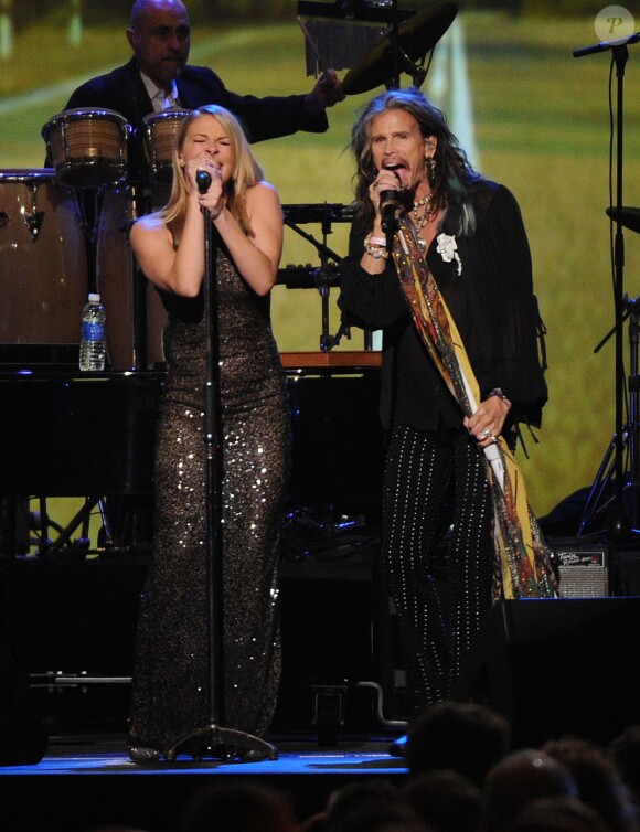 LeAnn Rimes et Steven Tyler en concert lors du gala MusiCares Person of the Year à Los Angeles, le 24 janvier 2014.