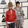 Pharrell Williams, un peu trop décontracté et accompagnée de sa femme Helen Lasichanh lors des 56e Grammy Awards au Staples Center. Los Angeles, le 26 janvier 2014.