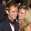 Jude Law et Sienna Miller lors de la présentation de leur film, Irrésistible Alfie à Londres le 14 octobre 2004