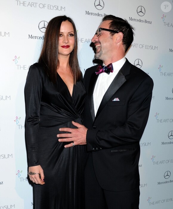 David Arquette et sa compagne Christina McLarty (enceinte) à Los Angeles, le 11 janvier 2014.