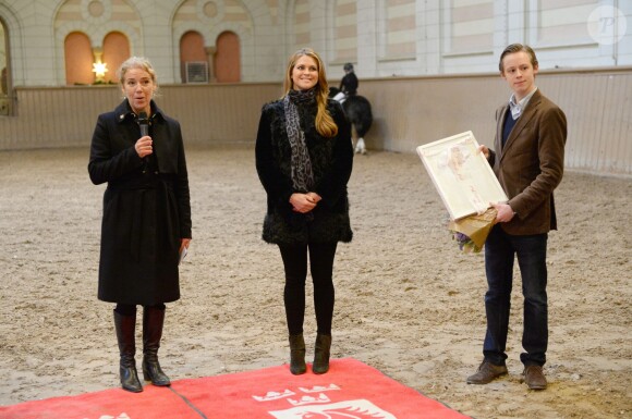 La princesse Madeleine de Suède, enceinte, aux écuries royales à Stockholm le 19 décembre 2013