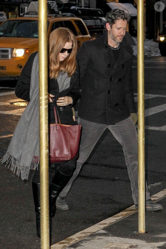 Amy Adams et son mari Darren Le Gallo lors de la veillée funèbre en l'honneur de Philip Seymour Hoffman à New York le 6 février 2014