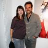 Exclusif - Christophe Michalak et son épouse Delphine McCarty, enceinte, lors du vernissage de l'exposition "Les filles à fromages" à la galerie Milk Factory à Paris, le 6 février 2014.