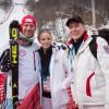 Le prince Albert II et la princesse Charlene de Monaco avec le Norvégien Aksel Lund Svindal (4e) lors de l'épreuve de descente le 9 février 2014 aux Jeux olympiques de Sotchi, en Russie.