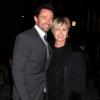 Hugh Jackman et sa femme Deborra-Lee Furness arrive au défilé-anniversaire de Donna Karan à New York le 10 février 2013