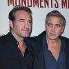 Jean Dujardin et George Clooney à la première de Monuments Men à Paris, le 12 février 2014.
