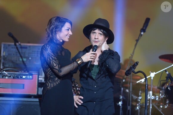 Nicolas Sirkis et Indochine lors de la cérémonie des 29e Victoires de la Musique au Zénith de Paris le 14 février 2014