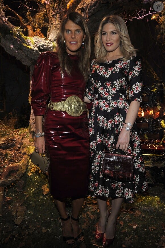 Anna Dello Russo et Hofit Golan assistent au défilé Dolce & Gabbana automne-hiver 2014-15 à Milan. Le 23 février 2014.