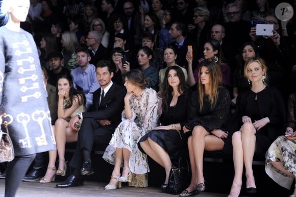 Le premier rang du défilé défilé Dolce & Gabbana automne-hiver 2014-15, avec Bianca Balti, David Gandy, Kate King, Monica Bellucci, Bianca Brandolini d'Adda et Eva Herzigova. Milan, le 23 février 2014.