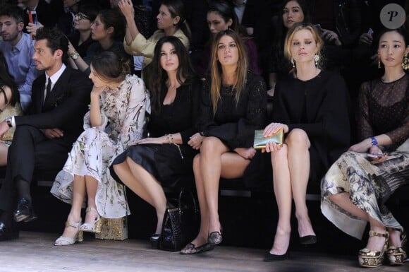 Kate King, Monica Bellucci, Bianda Brandolini d'Adda et Eva Herzigova assistent au défilé Dolce & Gabbana automne-hiver 2014-15 à Milan. Le 23 février 2014.