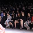Le premier rang du défilé défilé Dolce &amp; Gabbana automne-hiver 2014-15, avec Bianca Balti, David Gandy, Kate King, Monica Bellucci, Bianca Brandolini d'Adda et Eva Herzigova. Milan, le 23 février 2014.