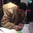 Drake s'est présenté à un meet &amp; greet dans la boutique Colette. Paris, le 24 février 2014.