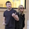 L'acteur Sam Worthington et sa petite-amie Lara Bingle font du shopping à Beverly Hills, le 1er décembre 2013