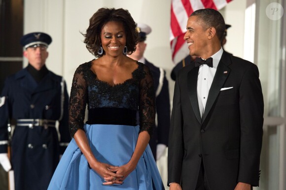 Barack Obama et son épouse Michelle lors d'un dîner d'Etat avec François Hollande à la Maison Blanche à Washington, le 11 février 2014