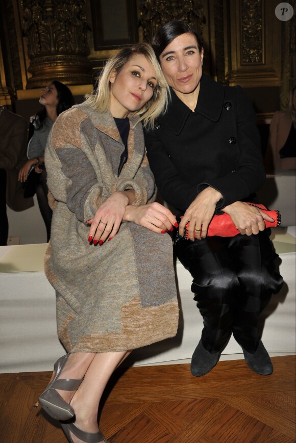 Noomi Rapace et Blanca Li assistent au défilé Stella McCartney automne-hiver 2014-2015 à l'Opéra Garnier. Paris, le 3 mars 2014.
