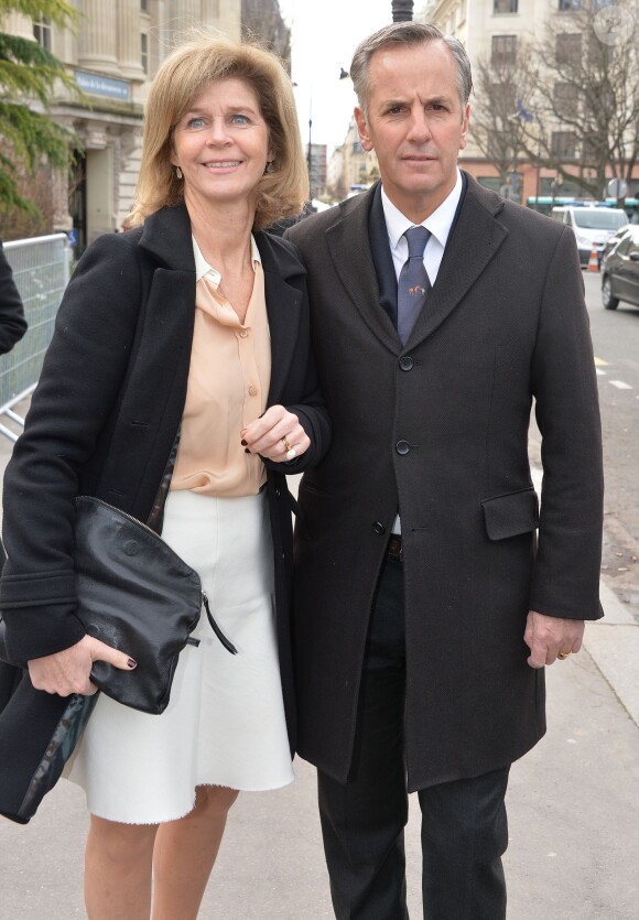 Bernard de la Villardière et sa femme Anne arrivent au Grand Palais pour assister au défilé Chloé. Paris, le 2 mars 2014.
