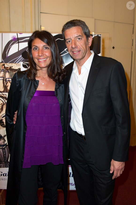 Michel Cymes et son épouse Nathalie lors du gala Enfance Majuscule, salle Gaveau à Paris le 10 mars 2014