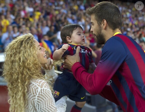 Shakira, Gerard Pique et leur fils Milan à Barcelone, le 14 septembre 2013.