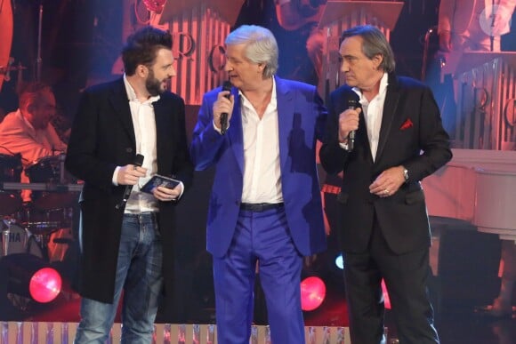 Helmut Fritz, Philippe Lavil et Patrick Sébastien lors de l'enregistrement de l'émission "Les années bonheur" à Paris le 5 mars 2014. L'émission sera diffusée, le 15 mars 2014.