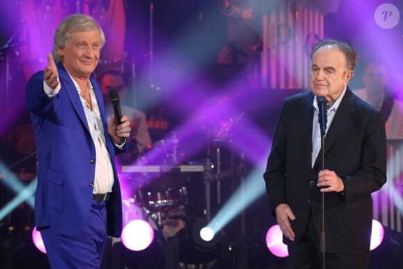 Guy Béart et patrick Sébastien lors de l'enregistrement de l'émission "Les années bonheur" à Paris le 5 mars 2014. L'émission sera diffusée, le 15 mars 2014.