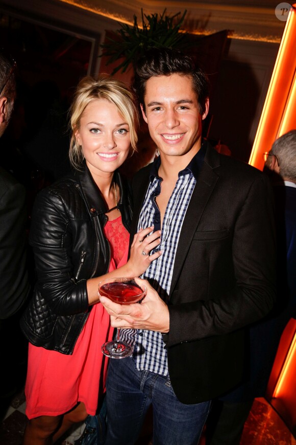 Caroline Receveur et son fiancé Valentin Lucas lors de l'inauguration du nouveau restaurant de l'Hôtel Vernet à Paris. 20 mars 2014