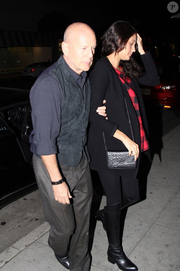 Bruce Willis et sa femme enceinte de leur second enfant, Emma Heming-Willis, à Los Angeles le 7 mars 2014