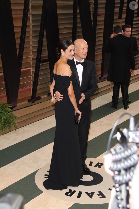 Bruce Willis et sa femme enceinte Emma Heming lors de la soirée Vanity Fair post-Oscars le 2 mars 2014