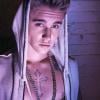 Justin Bieber s'est offert un nouveau tatouage, réalisé par l'artiste new-yorkais Bang Bang lors d'un vol amenant la star au Canada, le 28 janvier 2014.