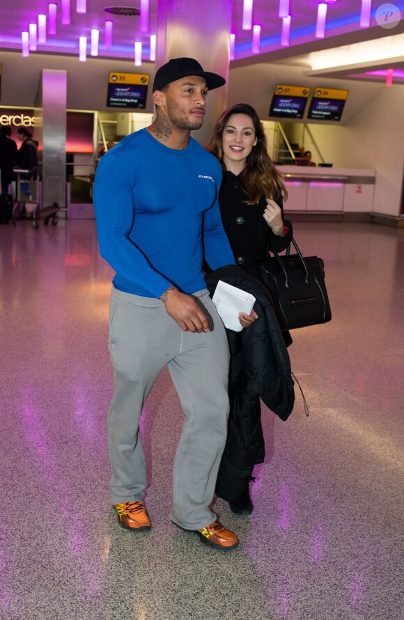 Kelly Brook et David McIntosh arrivent à l'aéroport d'Heathrow, pour emprunter un vol à destination de New York. Londres, le 24 mars 2014.