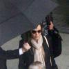 Angelina Jolie arrive avec deux de ses enfants à l'aéroport de Heathrow, à Londres, le 26 mars 2014.
