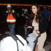 Kim Kardashian, de retour à Los Angeles avec sa fille North. Le 26 mars 2014.