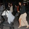 Kim Kardashian et sa fille North à l'aéroport de Los Angeles. Le 26 mars 2014.