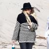 Ashlee Simpson sur une plage de Malibu avec son fiancé Evan Ross et la mère de dernier Diana Ross, le 28 mars 2014.