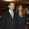 Manuel Valls et sa femme Anne Gravoin - Avant-première du film "Supercondriaque" au Gaumont Opéra à Paris, le 24 février 2014.