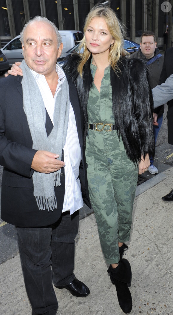 Kate Moss et Sir Philip Green arrivent au défilé TopShop lors de la fashion week à Londres, le 16 février 2014.