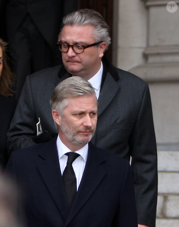 Le prince Philippe et le prince Laurent de Belgique en décembre 2009 lors des obsèques d'Alexandre de Belgique