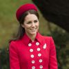 Kate Middleton, en manteau Catherine Walker et calot Gina Foster le 7 avril 2014 à la Maison du gouvernement de Wellington, au premier jour de sa visite officielle en Nouvelle-Zélande.