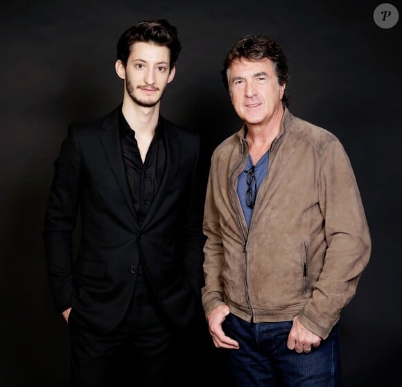 Pierre Niney et François Cluzet lors de la 33e édition du prix Romy Schneider et Patrick Dewaere à l'hôtel Scribe à Paris le 7 avril 2014.