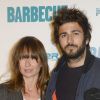 Axelle Laffont et son compagnon Cyril Paglino lors de l'avant-première du film "Barbecue" au cinéma Gaumont Opéra à Paris, le 7 avril 2014.