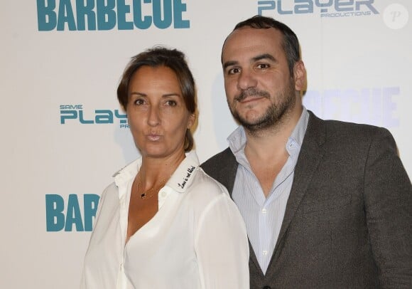 François-Xavier Demaison et sa femme Emmanuelle lors de l'avant-première du film "Barbecue" au cinéma Gaumont Opéra à Paris, le 7 avril 2014.