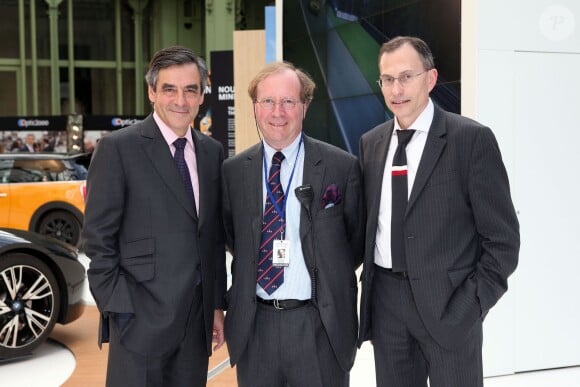François Fillon, Patrick Peter (organisateur du tour Auto) et Serge Naudin (président de BMW France) - Inauguration du Tour Auto 2014 (Optic 2000) au Grand Palais, à Paris le 7 avril 2014.