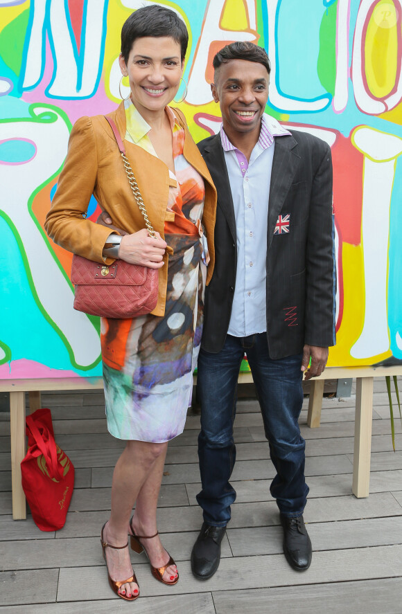 Cristina Cordula et l'artiste Robertinho Chaves lors de l'inauguration du Grand Carnaval brésilien "Sensacional Brasil" au Jardin d'Acclimatation à Paris, le 12 avril 2014.