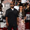Ice Cube et sa femme Kimberly Woodruff aux MTV Movie Awards, Nokia Theatre L.A. Live, Los Angeles, le 13 avril 2014.