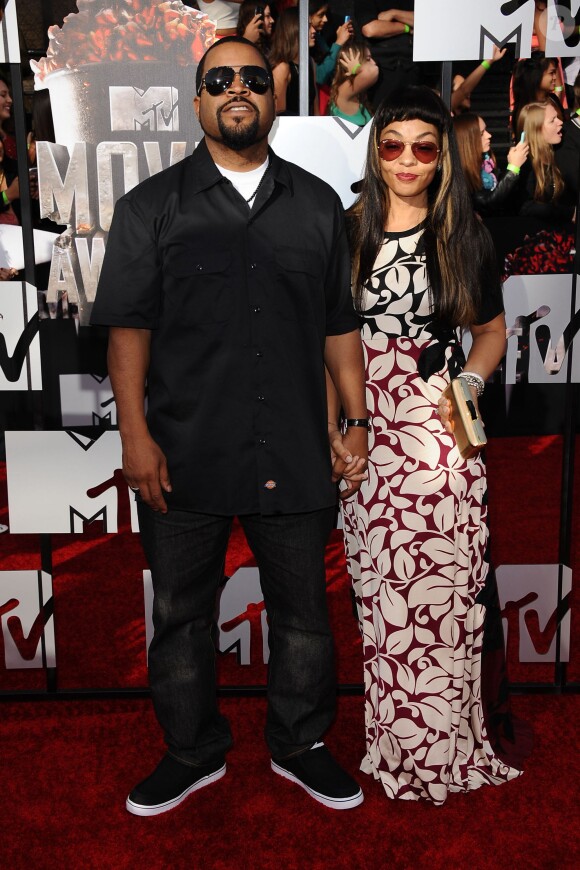 Ice Cube et sa femme Kimberly Woodruff aux MTV Movie Awards, Nokia Theatre L.A. Live, Los Angeles, le 13 avril 2014.