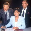 Guy Bedos et Claude Brasseur reçus par Anne Sinclair dans "7 sur 7" sur TF1, en 1990.