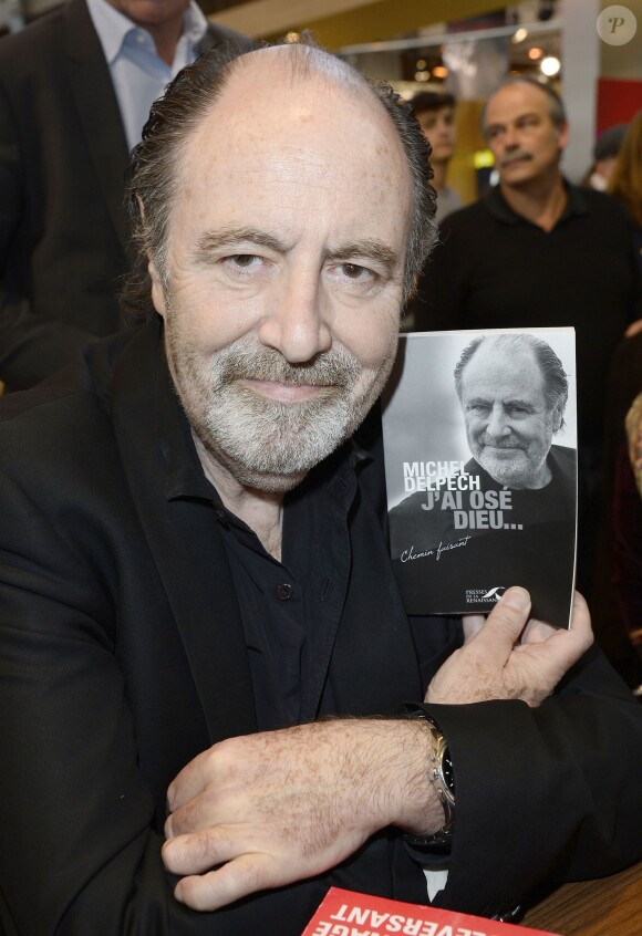 Michel Delpech à la 34e édition du Salon du Livre à Paris, Porte de Versailles, le 22 mars 2014.